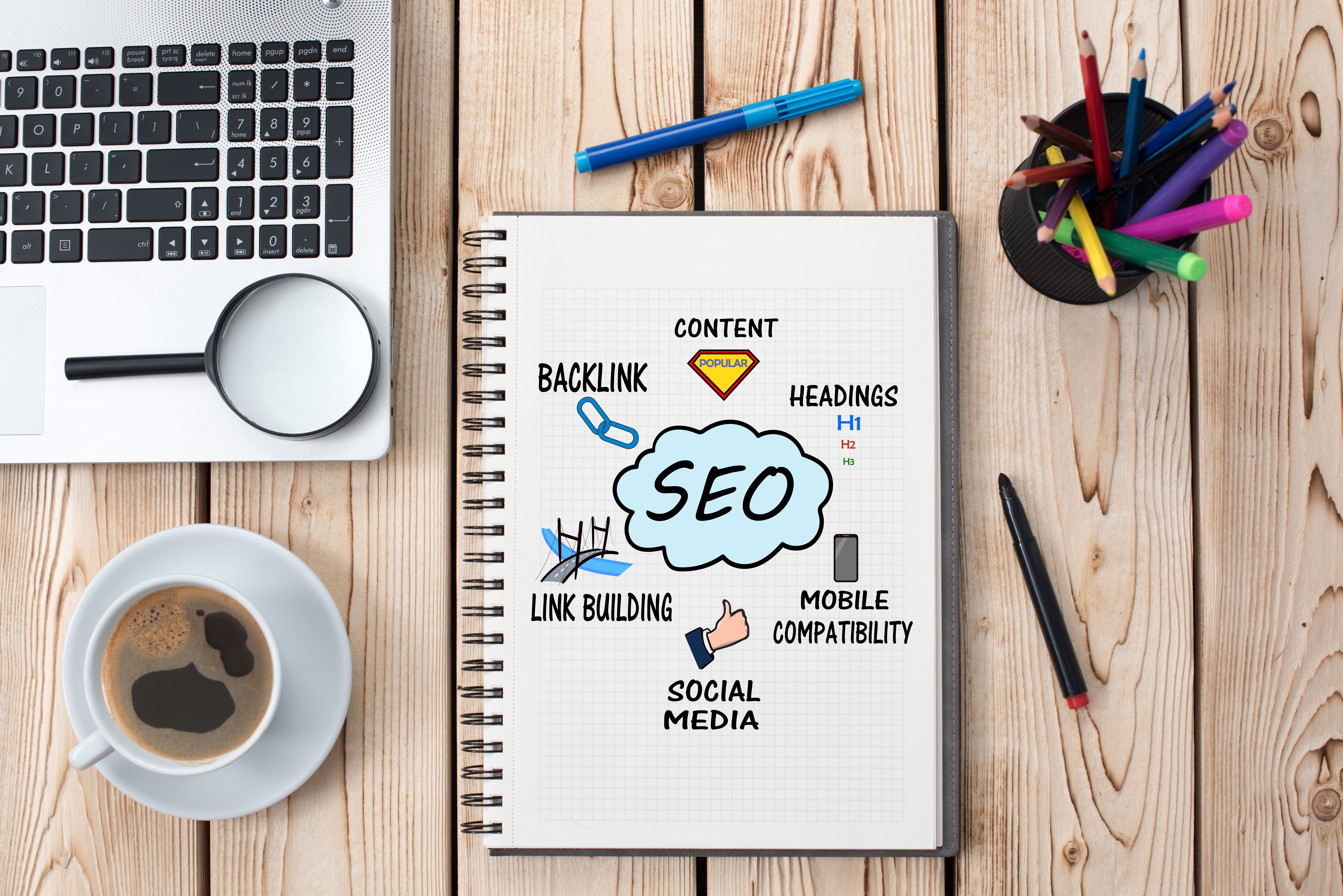 Notebook with SEO information in it.