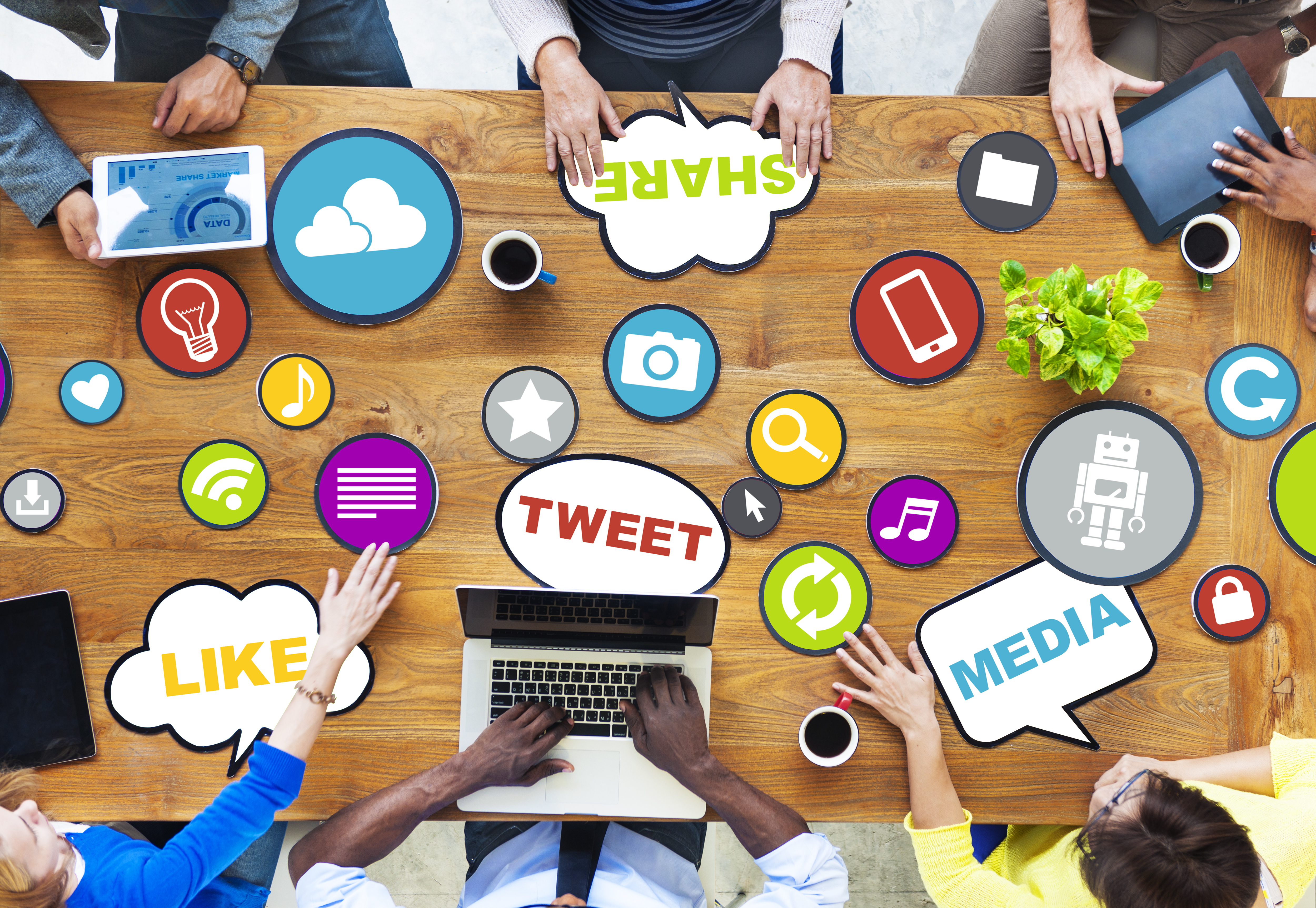 Table with stickers showing Like, Tweet, Share, and Media.
